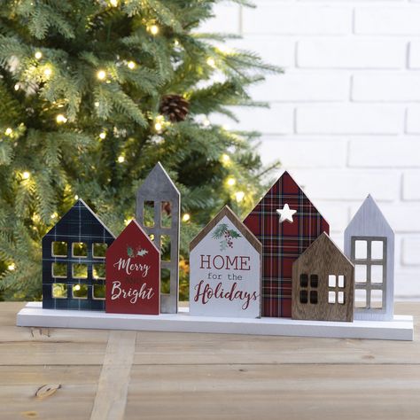 The 20"L Metal & wood Christmas house table decor crafted with 7 hallow out houses. You can set up it the center of a mantel or on a shelf. It can be added to accent the city scene. House Table Decor, Out Houses, Tafel Decor, Christmas Tabletop, Merry Christmas Sign, Wooden Houses, Christmas Decorations For The Home, Wood Christmas, Christmas House