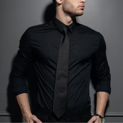 a young man wearing a black dress shirt Black Tie Aesthetic, Black Shirt Dress Outfit, Black Shirt Outfit Men, Attire Guide, Outfit With Tie, Sleek Black Dress, Black Shirt Outfits, Black Dress Shirt Men, Boys Formal Wear