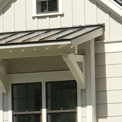 Shed Roof Over the Window on a Farmhouse Style House – Project Small House Shed roof overhang for windowHere is the little metal window roof from the side. Shed Porch Roof, Roof Over Back Door, Shed Portico, Shed Roof Over Garage Doors, Shed Overhang Ideas, Exterior Window Awnings Modern Farmhouse, Eyebrow Roof Over Window, Shed Style Porch Roof, Shed Roof Over Window