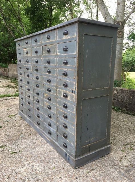 Rustic grey bank of drawers. Available at Reginald Ballum. Neutral Home Decor, Apothecary Cabinet, Card Catalog, Primitive Furniture, Neutral Home, Antique Cabinets, Drawer Cabinet, Vintage Storage, Luxury Homes Interior