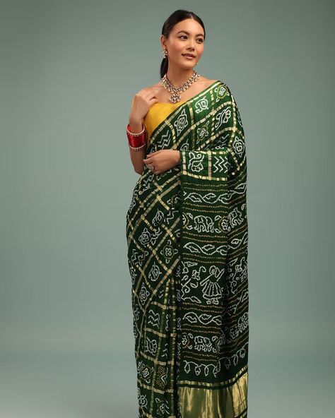 Forest Green Saree In Pure Silk With Bandhani Print & Brocade Work Step into enchanting elegance with our Forest Green Pure Silk Saree adorned with mesmerizing Bandhani print and intricate brocade work. Crafted to perfection, this saree captures the essence of timeless beauty and sophistication. The rich forest green hue adds a touch of mystique, while the exquisite detailing exudes opulence. Perfect for any occasion, this saree is sure to make you stand out with effortless grace and style. ... Forest Green Saree, Bandhani Print, Pure Silk Saree, Green Saree, Designer Saree, Pure Silk Sarees, Pure Silk, Silk Saree, Saree Designs