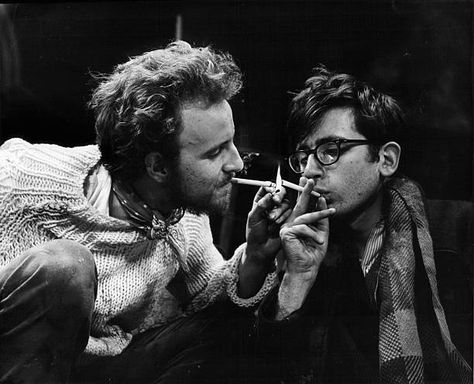 Victor Henry and Austin Pendleton lighting up each other's cigarettes in the play 'Hail Scrawdyke', 1966. Interaction Poses, Horror Aesthetics, Couple Reference, Mob Boss, Pose Photography, Alcohol Aesthetic, Anatomy Poses, Three Boys, Person Sitting