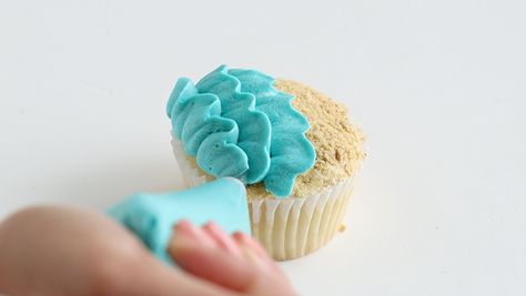 Beach Cupcakes | by Whitney DePaoli for TheCakeBlog.com Beach Cupcakes Ocean Themes, Beach Themed Cupcakes, Ocean Cupcakes, Beach Theme Cupcakes, Rosette Cupcakes, Whale Cakes, Edible Sand, Sea Cupcakes, Beach Cupcakes