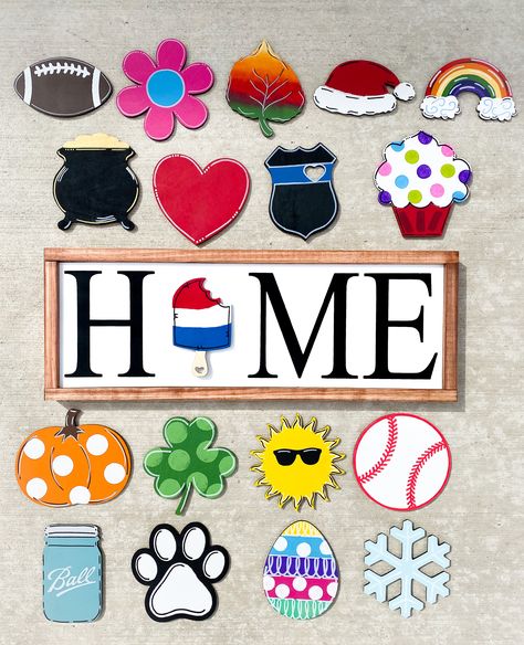 "You are purchasing the Home Sign with Four (of your choice) changeable pieces. Additional pieces may be purchased at $5 a piece with this listing. https://www.etsy.com/Napcreations/listing/1214158923 Sign Size: 9\"x 24\" Interchangeable Piece Size: approx. 6\" Available Shapes: Football Flower Leaf Santa Hat Rainbow Pot O Gold Heart Badge Cupcake Popsicle Pumpkin Shamrock Sun Baseball Mason Jar Paw Print Easter Egg Snowflake Each piece is removable and is held in place by a Velcro circle The fr Baseball Mason Jar, Welcome Sign With Interchangeable Wreath, Interchangeable Seasonal Decor, Interchangeable Home Sign, Welcome Sign With Interchangeable Pieces, Seasonal Interchangeable Signs, Pot O Gold, Engraver Ideas, Home Wood Sign