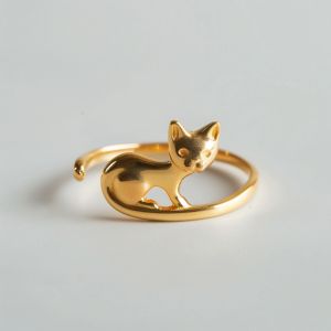 Embrace your love for feline elegance with YoPaCat's Cute Minimalist Golden Cat Ring. This charming ring features a sleek golden cat design, complete with a playful tail that wraps gracefully around your finger. Crafted with simplicity and style in mind, this piece is perfect for cat lovers who appreciate understated beauty. Whether you're dressing up for a special occasion or adding a touch... Cat Rings, Golden Cat, Cat Ring, Metal Work, Cat Design, Feline, Cat Lovers, Special Occasion, Sleek