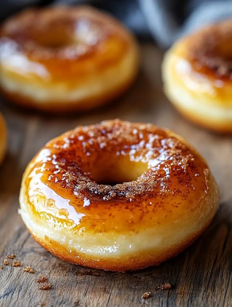 Picture this: a warm, fluffy donut with a rich crème brûlée topping, perfectly caramelized sugar crackling under your bite. The Crème Brûlée Donuts are not just dessert; they are a celebration of flavors and textures that will elevate your baking game! This recipe is special because it combines two beloved indulgences into one delightful treat, perfect for any occasion – from brunch with friends to a sweet end to a fancy dinner. Honey Glazed Donut, Creme Brulee Donut, Bavarian Cream Filling, Cream Filled Donuts, Fancy Donuts, Donut Toppings, Bavarian Cream, Donuts Recipe, Filled Donuts