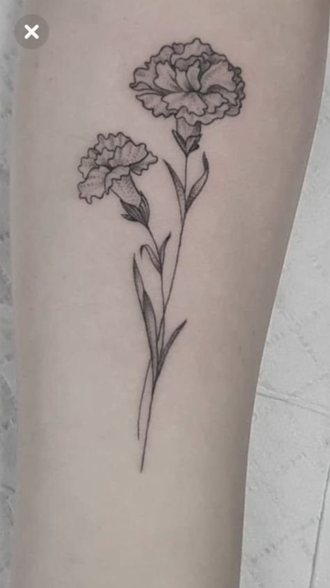 205+ Adorable Marigold Tattoos Ideas (2023) - TattoosBoyGirl Carnation Flower Tattoo Hip, Hadestown Flower Tattoo, Carnation Hip Tattoo, Carnation Flower Tattoo Arm, Simple Carnation Tattoo, Hadestown Tattoo, Carnation Tattoo Design, Marigold Tattoos, Carnation Flower Tattoo