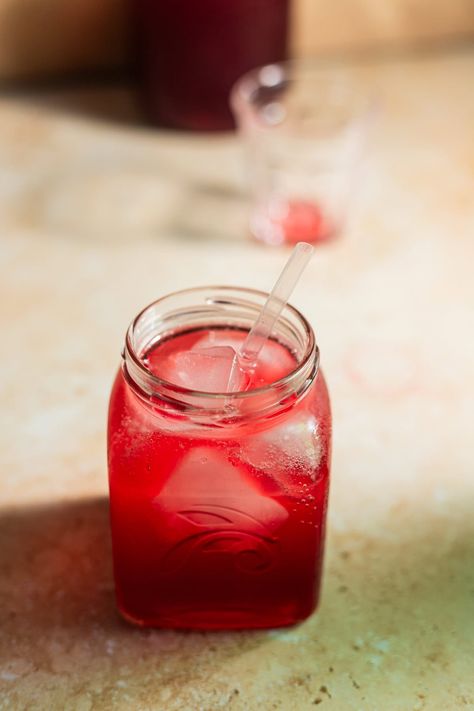 A drinking glass set on a countertop filled with ice cubes, a bright red soda, and a straw. Blackberry Shrub, Shrub Recipe, Drinking Vinegar, Easy Weekend Projects, Cocktails And Mocktails, Delicious Drink Recipes, Keeping It Simple, Food Test, Recipe Steps