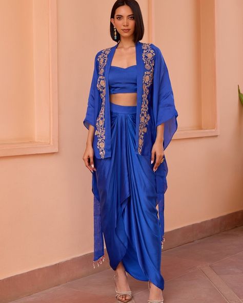 Monday blues be like this 💙 Find it on Fabilicious ✨ WhatsApp us on +91 99992 89222 for any queries 🌟Made to Measure 🌟Personal service with VC for measurements 🌟 Trusted Brand #indianwedding #linkinbio #indiandesigner #weddingcollection #new #weddingguest #newcollection #sangeet #glam #mehendi #saree #indianwedding #sangeet #summerwedding #mehendi #mehendilehenga #blue #indowestern #mondayblues Drape Skirts Indo Western, Indo Western Saree Drape, Drape Saree Indo Western, Mehendi Saree, Indo Western Saree, Skirt Satin, Satin Bustier, Skirt Lining, Top Satin