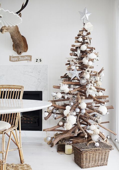 Rustic Stacked Branch Christmas Tree | Kara Rosenlund Jul Diy, Driftwood Christmas Tree, Alternative Christmas, Modern Christmas Tree, Alternative Christmas Tree, A White Christmas, Traditional Christmas Tree, Coastal Christmas, Wooden Christmas Trees