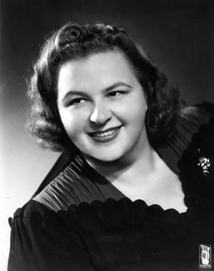 Kate Smith had a long and very successful career, making many tunes popular, but making two uniquely her own: Irving Berlin's "God Bless America", and "When the Moon Comes Over the Mountain". She  hosted and performed on The Kate Smith Show from 1950 through 1954, hosting until 1953 in the late afternoon hour of 4:00 pm ET. At that hour, she had a following of many children. I was one of them. Merle Oberon, Greatest Generation, Choir Director, Kate Smith, Irving Berlin, Armistice Day, Music Practice, Sean Penn, Radio Show