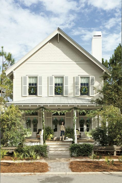 Over-the-Top Garland Texas Country Homes, Christmas Exterior, Porch Garland, Florida Cottage, Southern Porches, Window Wreath, Rustic Retreat, Beach Cottage Style, Coastal Christmas