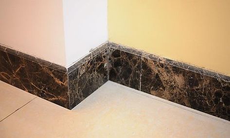 Marble Tile Baseboard Bathroom Tile Baseboard Ideas, Ceramic Baseboard, Tile Baseboard Bathroom, Bathroom Baseboard Ideas, Bathroom Baseboard, Craftsman Style Trim, Tile Baseboard, Tall Baseboards, Wood Baseboard