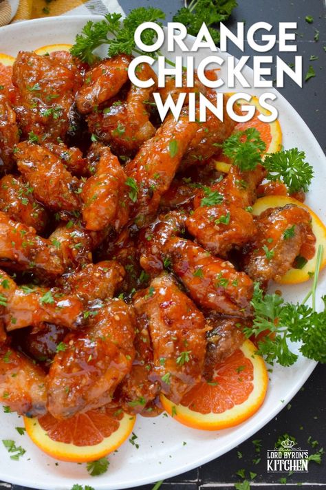 These very sticky wings are prepared with orange marmalade preserves, barbecue sauce, hot sauce, chilies, and seasonings. Orange Chicken Wings are the stickiest and most delicious wings you'll ever eat! They are baked until crispy on the outside and tossed in one of the quickest and easiest sauces! These wings don't need a special occasion; serve these any time you feel like it! #orange #wings #chicken #bbq #sauce #hotsauce Chicken Wings Cooked In Orange Juice, Wings Sauces Homemade, Dr Pepper Chicken Wings, Orange Chicken Wings, Chicken Bbq Sauce, Breaded Chicken Wings, Wing Sauces, Sticky Wings, Southern Appetizers