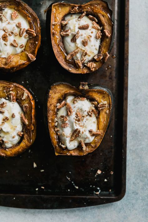 Breakfast acorn squash baked with spices and stuffed with yogurt, pecans and a drizzle of honey. A delicious, protein-packed meal to start your morning! Acorn Squash Baked, Acorn Squash Recipe, Recipe For Fall, Packed Breakfast, Baked Squash, Ambitious Kitchen, Overnight Oat, Squash Recipe, Fall Recipe