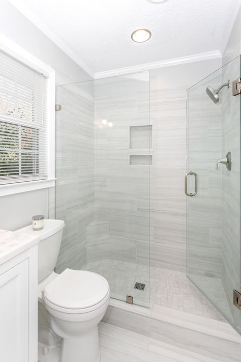 White Glass Tile Shower Ideas, Walk In Shower White Tile, 60 Inch Walk In Shower Ideas, Walkin Shower With Window Ideas, White And Grey Shower Tile Ideas, Grey White Shower Tile, White Shower Grey Floor, Light Gray Shower Tile Ideas, Walk In Shower Guest Bathroom