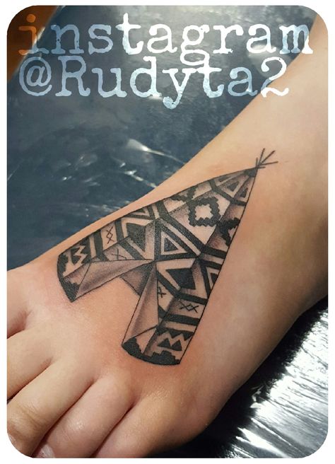 Teepee tattoo done on the foot. A small tattoo done in black ink. Artist Rudy Acosta captured the small details and smooth shading to make this one of the best teepee tattoos on Pinterest and instagram. Follow this artist on instagram @Rudyta2. #tattoo #tattoooftheday #tattoos #tattooed #inkedup #inked #clovisink #clovisinktattoo #cooltattoos #daily #femaletattoo #rudyacosta #rudy #rudytattoo Tee Pee Tattoo, Teepee Tattoo, Indian Chief Tattoo, Chief Tattoo, Religion Tattoo, Religion Tattoos, Western Tattoo, Artwork Tattoo, Jewel Tattoo