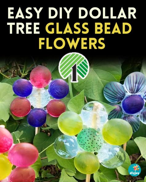 Turn glass beads from Dollar Tree into these beautiful flowers with this easy and fun tutorial. Find the instructions here. Dollar Tree Beads Diy, Glass Beads Crafts, Glass Bead Crafts Diy, Marble Crafts, Homemade Flowers, Glass Bead Crafts, Marbles Crafts, Bead Flowers, Bead Crafts Diy