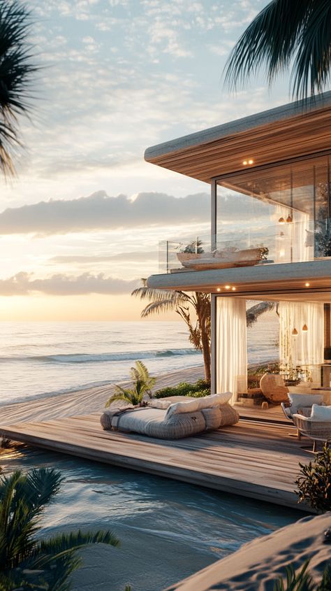 Image description: A trendy beach house with a deck surrounding the ocean. Modern Beach House Exterior Ocean Views, Beach Houses Exterior, Beach House View, Modern Beach House Exterior, Big Beach House, Beach Luxury House, Beach View House, Beachfront Homes, Action Board