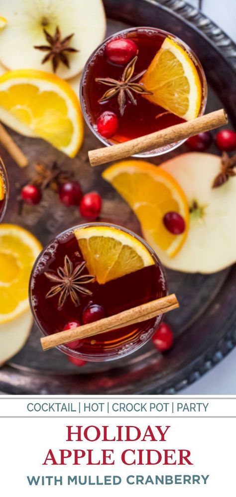 This Hot Spiked Cranberry Mulled Cider recipe is the perfect holiday drink for a crowd. An easy cocktail made in the crock pot with apple cider, cranberry juice, cinnamon, clove, star anise, orange slices and spiked with spiced rum. A must make for your next holiday party! #cocktail #holidaydrinks Spiked Mulled Cider Recipe, Spiked Cider Recipes, Cranberry Crockpot, Spiked Apple Cider Recipe, Cider Drink Recipes, Crockpot Apple Cider, Caramel Apple Cider Recipe, Spiced Apple Cider Recipe, Hot Apple Cider Recipe