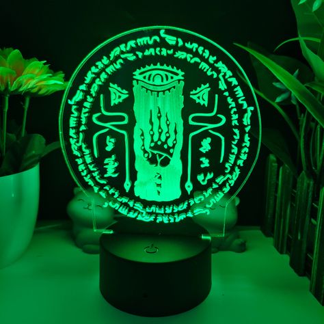 This Tears of the Kingdom Night Light is the perfect addition to your Zelda collection, offering four iconic symbols from the beloved video game franchise. ◆ LIGHT UP THE NIGHT: Choose from symbols from The Legend of Zelda: Tears of the Kingdom Ultrahand & Sheikah Slate to illuminate your space. ◆ MULTIPLE LED COLORS: With 16 colors to choose from, this night light can be customized to suit any mood or occasion, and can be controlled by remote or touch. ◆ REMOTE CONTROL: The included remote cont Zelda Boys Bedroom, Legend Of Zelda Room Decor, Zelda Room Ideas, Zelda Themed Room, Legend Of Zelda Decor, Zelda Game Room, Zelda Room Decor, Zelda Bedroom, Zelda Room