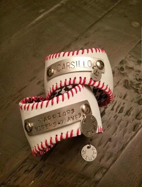 "For your favorite player! Totally personalized for your team name and child number. Hand stamped name plate so it can have your last name, your team name, your son's name, or anything else you would like!  The hanging charm can be customized with the number or initial as well. Note the example on the bottom for a mother who has kids on multiple teams. Just add in the notes exactly what you would like your bracelet to say. Also note if you would like the vintage look or new baseball as pictured Team Bracelets, Baseball Bracelet, Bracelet Name, Student Teacher Gifts, Personalized Baseballs, Sports Decorations, Crafts To Make And Sell, Spirit Wear, Sports Mom