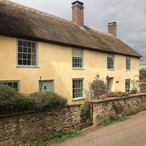 colin gray on Instagram: “The charm of unpretentious simplicity... Lime washed thatched cottages in sleepy Colyton, Devon #thatchedcottage #thatch #limewash…” Limewash House Exterior, Limewash Brick Cottage, Lime Render Exterior, Thatched Cottage Exterior, Lime Slurry Stone Exterior, Cottage Exterior Ideas, Thatched Roof Cottage, Suffolk House, Cottages Uk