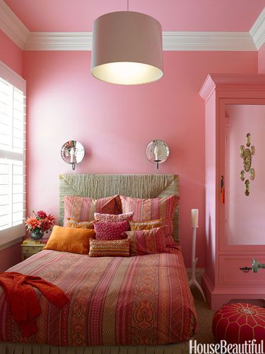 Cheery Pink  A girl's bedroom in a San Francisco home is painted Benjamin Moore's Tickled Pink because it counteracts the gray and foggy light of the city. "Pink is warmer and more enveloping," designer Stephen Shubel says. Murs Roses, Bedroom Color Combination, Bedroom Orange, Pink Bedrooms, Bedroom Pictures, Decoration Originale, Design Del Prodotto, Pink Interior