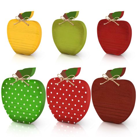 PRICES MAY VARY. Retro Apple Wood Ornaments: indulge in the charms of yesteryear with our uniquely designed vintage apples decorations in 6 different styles; Crafted from solid and reliable wood, these decorations flaunt a retro style that adds a nostalgic touch to any setting; Available in vibrant colors of red, green, and yellow, they provide an artistic accent that is sure to grab your guest's attention Crafted with Care: made from quality wood, these apple ornaments boast a solid and robust Handmade Windchimes, Wood Tiered Tray, Coffee Table Pictures, Table Centerpieces For Home, Vintage Centerpieces, Outdoor Metal Wall Art, Table Centerpiece Decorations, Apple Decorations, Farmhouse Vintage