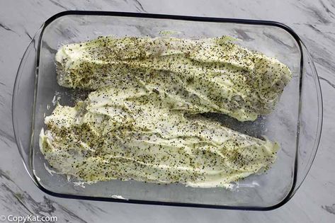 Enjoy flaky, baked white fish with a tasty crust for dinner. Use tilapia, cod, haddock, or your favorite white fish. A simple breaded seafood filet is topped with mayonnaise and seasoning then baked and broiled to perfection. Get this quick and easy Luby's copycat recipe. #fishrecipes #bakedfish #seafoodrecipes #tilapia #ovenbaked #copycat #copycatrecipes #quickandeasy Copycat Lubys Baked Fish, Lubys Baked White Fish, Luby’s Baked White Fish, Cod Fish Recipes Baked With Mayo, Haddock Fish Recipes Baked, Lubys Fried Fish Recipe, Baked White Fish Recipes, Whiting Fish Recipes, White Fish Recipes Baked