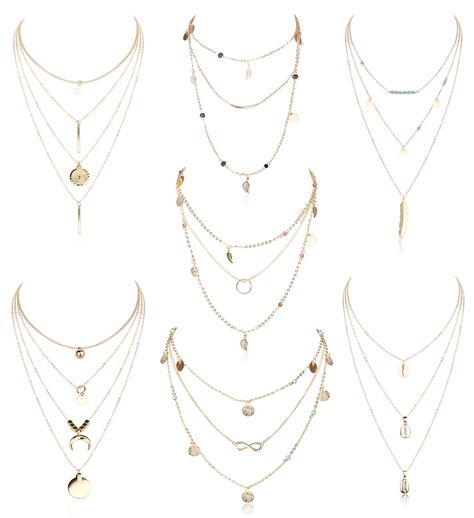 PRICES MAY VARY. Layered Necklace Set:One Order Includes 7PCS Gold Tone Dainty Layered Necklaces, Which Combine the Most Fashionable Elements:Star, Ball, Horn, Infinity, Leaf, Bead, Feather, Shell, Circle, Bar and Coin Charm, Perfect Layering Necklaces for Women and Girls Multi Layered Necklaces:5PCS 3 Layer Necklaces and 2PCS 4 Layer Necklaces, Easy to Match Any Outfits, Especially V-neck Tops Size&Material:Each Layered Necklace With 2"(5CM) Extender Chain, Adjustable Length, Fit for Most of Pe 3 Layer Necklace, Circle Bar, Coin Pendant Necklace, Layered Necklace Set, Multi Layer Necklace, Pendent Necklace, Stacked Jewelry, Layered Jewelry, Gold Necklace Layered