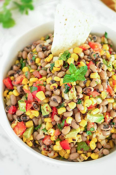 Zesty Black-Eyed Pea and Corn Salsa Recipe is a breeze to make and is bursting with fresh, vibrant flavors. Bring out a bag of your favorite tortilla chips and watch it disappear. #glutenfree #veganappetizer, #gamedayappetizer #partytime Black Bean Salsa Recipe, Peas And Corn, Black Eyed Pea Salad, Black Eyed Peas Recipe, Salsa Party, Corn Salsa Recipe, Black Eyed Pea, Black Bean Salsa, Corn Salad Recipes