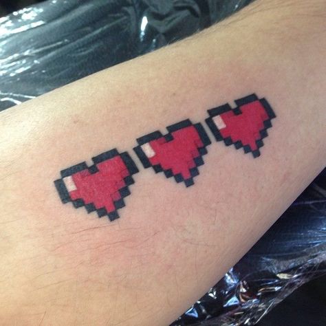 Small Tattoos Archives - Chronic Ink Heart Container Tattoo, Pixel Heart Tattoo, Arm Tattoos For Women Upper, Zelda Heart Container, Zelda Heart, Pixel Tattoo, Heart Container, Mario Tattoo, Pikachu Tattoo