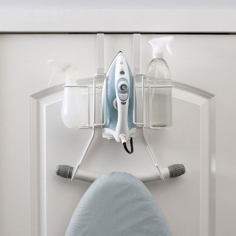 Keep your laundry room organized with the Organize It All over the door ironing board holder. Designed with 2 hooks to hold a standard ironing board and shelf to hold an iron and 2 bottles. Conveniently hangs on the back of the door to maximize space. Made of a metal frame for strength and keeps all your ironing food in one area for easy access. Over The Door Ironing Board, Door Ironing Board, Ironing Board Hanger, Ironing Board Holder, Door Iron, Board Storage, Iron Holder, Making Space, Laundry Room Storage