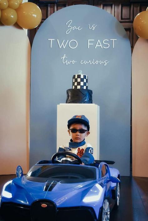 Race in to see this fabulous "Two Fast, Two Curious" Race Car 2nd Birthday Party by Karey Lyle Carreon, out of Rancho Mission Viejo, CA! Fueled up with racing checks, fast cars and so much more, this celebration will have you floored! So hit the gas and rev it up to spot these details that I just love: Two Fast Two Curious Panel Backdrop Race Way Themed Balloon Garlands Racing Themed Birthday Cake Custom Race Car Signage Fuel Station Sweet + Snack Table Cute Race Car Favor Cookies The post &#822 2 Fast Backdrop, Two Fast Two Furious Birthday, Race Car 2nd Birthday Party, Car 2nd Birthday Party, Two Fast Two Curious, Car Signage, Two Fast, Two Fast Birthday Party, Two Fast Two Furious