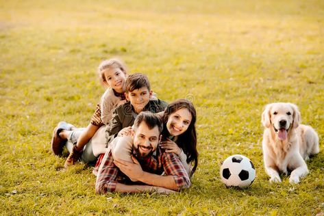 Happy family with two children lying in a pile on grass with dog sitting stock image Quinces Photoshoot, Smile Images, Family Poses, Future Dreams, Bearded Collie, Family Shoot, Puzzle For Adults, Family Images, Puppy Party