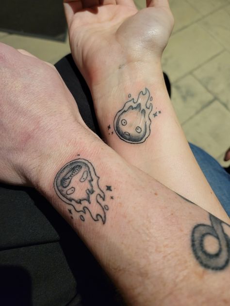 Calcifer Matching Tattoo, Howls Moving Castle Matching Tattoos, Anime Matching Tattoos, Anime Couple Tattoos, Cute Couple Tattoo, Howl's Moving Castle Tattoo, Couples Tattoo, Castle Tattoo, Cute Couple Tattoos