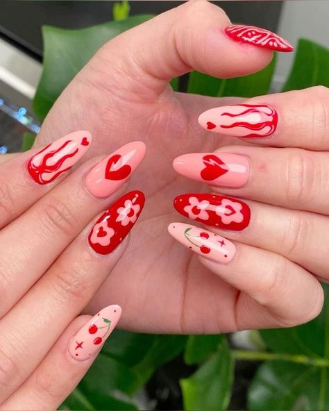 The design features subtle ombre, delicate stripes, and tiny heart details, creating a playful yet sophisticated look. Ideal for expressing love and affection, these nails add a touch of romance to any outfit. They are suitable for all nail lengths and shapes, ensuring everyone can celebrate love in style. #ValentinesNails #RomanticManicure #HeartNailArt #PinkAndRedNails #DateNightNails #LoveInspiredNails #GlitterAccents #OmbreNails #NailArtIdeas Valentines Day Nails Funky, Red Vday Nails Valentines Day, Strawberry Valentines Nails, Valentines Day Nails Cherry, Funny Valentines Day Nails, Anti Valentine’s Day Nails, Abstract Valentines Nails, Alternative Valentines Nails, Grunge Valentines Nails