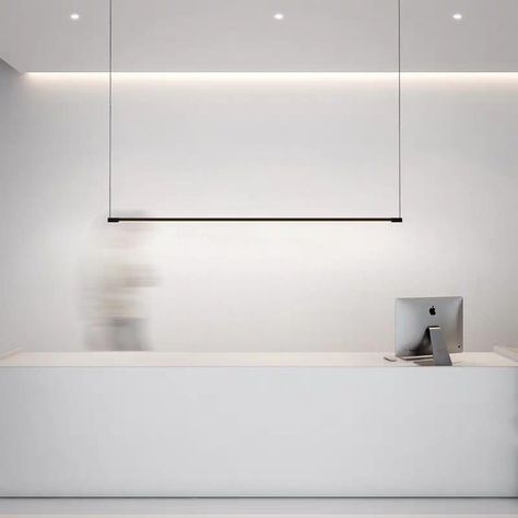 Looking to achieve that designer or architectural look with a modern light fixture that is both sleek and functional for either an urban home or commercial application? This black minimalist linear LED pendant fixture is suspended with wires to give the illusion of invisibility without any extra frills for simple sophistication. Perfect for hanging over a dining table, boardroom table, kitchen counter, bar, work surface or reception counter. Is Bulbs Included: Yes, Power Source: AC, Installation Linear Light Fixture, Simple Pendant Light, Modern Lighting Chandeliers, Linear Pendant Light, Reception Counter, Boardroom Table, Black Minimalist, Counter Bar, Minimalist Lighting