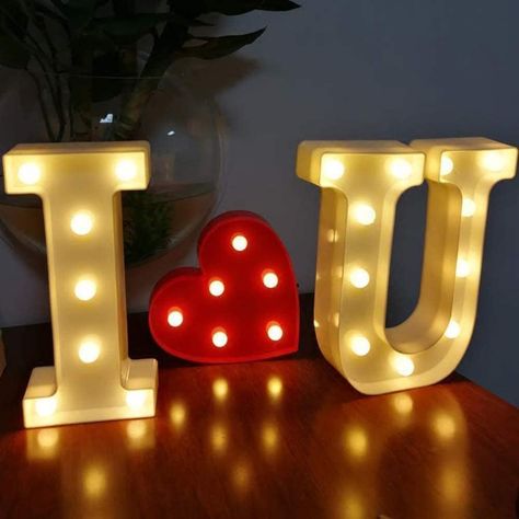 PRICES MAY VARY. ☑【 1 . 8.7” Tall Silver Color 】The 8.7" tall Silver marquee letter I, Heart Shape, U, spells out "I O U ", beautiful warm white glow with a gorgeous "IOU", creating a soothing, relaxing and elegant mood. ☑【 2. Approx size(singel letter: 】 W7.1"×H8.7"×D1.8". On lanyard at top for easy display on the wall or just rest on mantle, shelf, table or dresser. ☑【3. No power outlet 】needed & each letter requires 2 AA batteries (not included),an ON/OFF switch at back for manual control. ☑【 Letters Lights, Romantic Surprises For Him, Led Letter Lights, Led Heart, Led Letters, Loving You Letters, I Love You Lettering, Engagement Signs, Romantic Surprise