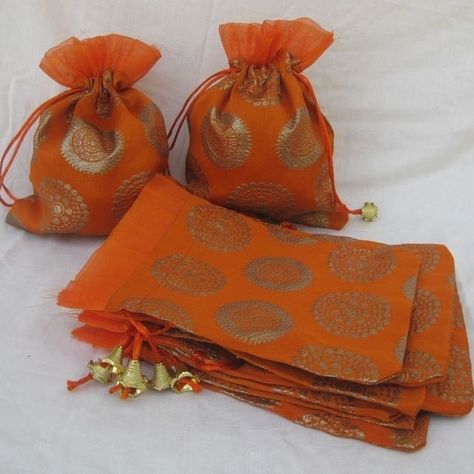 Bidh Pouches for Nikah Ceremony Enhance your Nikah ceremony with our Handmade Bidh Pouches, thoughtfully designed to add a touch of elegance and tradition to your special day. These pouches can be customized to fit your color theme and design preferences, making them a perfect addition to your wedding setup. Ideal for holding small gifts or traditional items, our Bidh Pouches offer both functionality and beauty. Features: - Customizable Design: Personalize each pouch to match your wedding t... Orange Bags, Bags Fabric, Pumpkin Patch Outfit, Wedding Gifts Packaging, Children Party, Potli Bag, Return Gift, Potli Bags, Dry Fruits