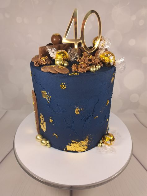 Navy and Gold 40th Birthday Cake, topped with chocolates Gold 40th Birthday Cake, 40th Birthday Cakes For Men, 40th Cake, 40th Birthday Cake, 40th Birthday Cakes, Birthday Cakes For Men, Cakes For Men, 40th Birthday, Birthday Cakes