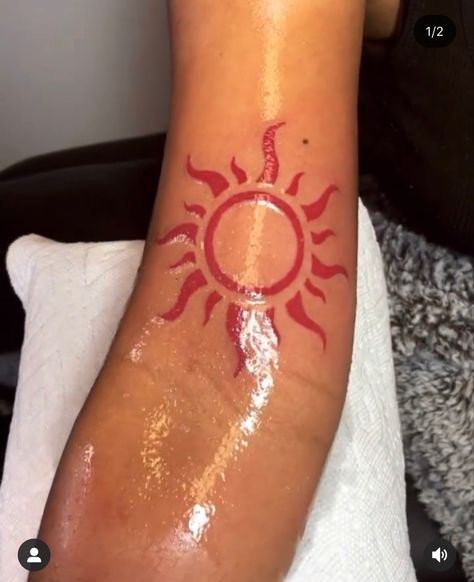 Red sun tattoo 🌞 Red Ink On Black Women, Red Ink Tattoo Ideas For Men, Red Ink On Brown Skin Tattoo, Fiery Sun Tattoo, Novacane Tattoo, Sun Red Tattoo, Red Sun Tattoo Black Women, African Sun Tattoo, Red Chest Tattoo Female