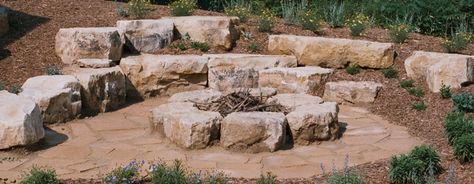 Boulder fire pit with boulders to sit on around it? | Boulder ... Wyoming Landscaping, Backyard Shed Landscaping, Boulder Fire Pit, Boulder Landscaping, Landscape Boulders, Backyard Fire Pits, Shed Landscaping, Backyard Fire Pit, Pergola Pictures