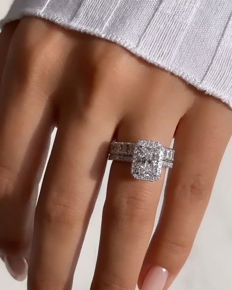 Nuno Rocha on Instagram: "Introducing this breathtaking @diamondboi engagement ring, a true masterpiece that exudes elegance and sophistication. This exquisite ring features a dazzling 2.00ct radiant cut diamond, expertly placed in a cut cornered halo setting, accentuating its brilliance and fire. The halo design adds a touch of glamour and creates a mesmerizing focal point. To complete the ensemble, this stunning ring is paired up with a radiant cut eternity band, showcasing a continuous row of radiant cut diamonds, symbolizing eternal love and commitment. Crafted with meticulous attention to detail, this @diamondboi engagement ring is a testament to timeless beauty and impeccable craftsmanship, making it the perfect symbol of your everlasting love story. Why join the @diamondboi family Halo Radiant Engagement Ring With Band, Radiant Halo Engagement Ring With Band, Radiant Engagement Ring With Halo, Square Engagement Rings Silver, Radiant Eternity Band, Radiant Cut Engagement Ring With Band, Engagement Rings And Wedding Bands Set, Halo Radiant Cut Engagement Ring, Radiant Halo Engagement Ring