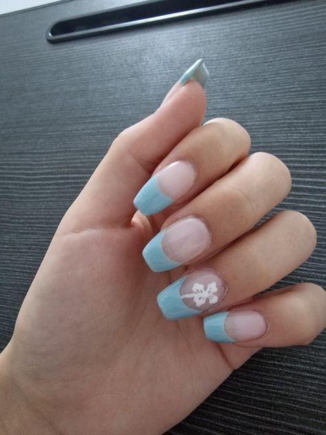 Blue French tip nail design inspo with hibiscus flowers Nails French Tip Flowers, Asymmetrical French Tip, French Tip Flowers, Fiji Nails, Blue French Tip Nails, Blue French Tip, Blue French Tips, French Tip Nail Designs, Blue French