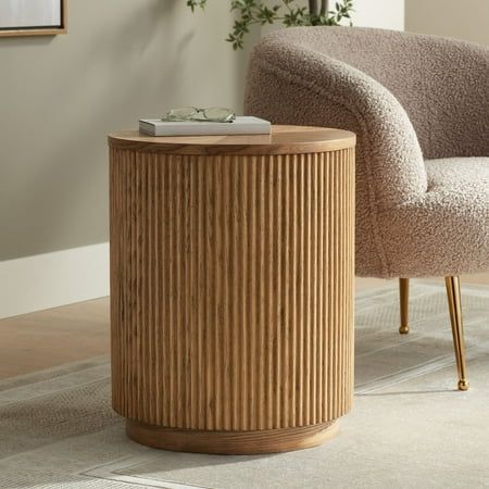 With a natural and study design, the Perch round side table from the Studio 55D brand is the perfect option for adding rustic style to your living space. The solid oak construction is reminiscent of a carved tree stump, complete with rounded ridges and a naturalistic star pattern on the tabletop. No assembly required, this side table ships in one amazing piece. Size: 22 x 18 x 18.  Color: Brown. Solid Side Table, Small Round Tables Living Room, Round Side Tables For Living Room, Living Room Nesting Tables, Rounded Furniture Design, End Table For Living Room, Light Oak Side Table, Mid Century Side Tables, Round Side Table With Storage