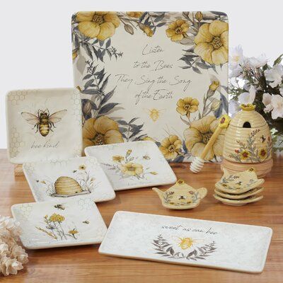 “Bee Sweet” is a charming ceramic dinnerware and serveware collection from Certified International. Designed by Susan Winget, it features busy bees and flowers along with sweet sentiments and a unique 3-d beehive teapot. | Certified International Bee Sweet Set / 4 Canape Plates, Asst. Ceramic / Earthenware / Stoneware in Yellow | Wayfair Tea Bag Plate, Bee Plates, Bee Sweet, Susan Winget, Appetizer Plates Set, Busy Bees, Food Storage Containers Organization, Ceramic Dinnerware, Cheese Plate