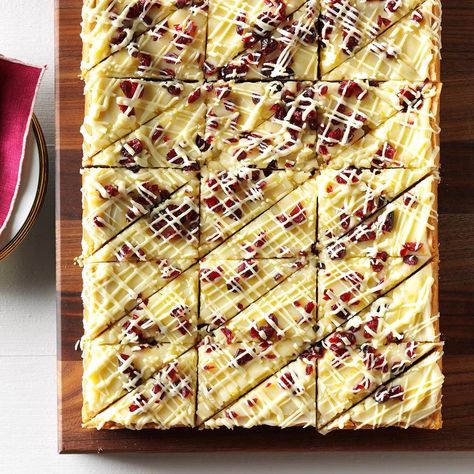 Friends sometimes ask me to make these for wedding receptions. For a fancier presentation, I cut the bars into triangle shapes and drizzle white chocolate over each one individually. —Erika Busz, Kent, Washington White Chocolate Cranberry Blondies, Cranberry Blondies, Bliss Bars, Cranberry Bliss, Cranberry Bliss Bars, Cranberry Cream Cheese, Potluck Desserts, Vegetarian Bake, Blondies Recipe