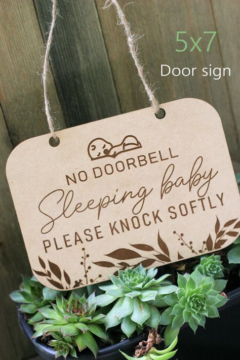 "D E T A I L S .➽.═╝ * This listing includes a \"no doorbell baby sleeping sign\" strung with burlap twine. * Made with Draftboard wood. * Measures 5x7\" in diameter and is 1/8\" thick (3 mm). ♥THANK YOU♥ Thank you for taking the time to check out my shop and or products. If you have any questions or special requests, please feel free to contact me any time - I will gladly get back with you! God bless. Sarah.. Copyright © by RollingHillsMemories, 2019" Please Knock Sign, Baby Sleeping Sign, Newborn Announcement, Pet Remembrance, Picture Engraving, Wood Tags, Best Baby Shower Gifts, Wooden Cards, Dog Wall Art